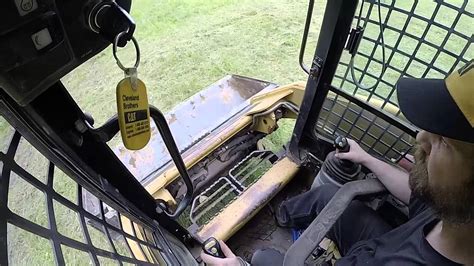 cat skid steer controls